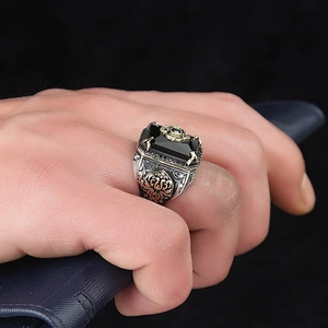Vintage silver ring with black rectangular gemstone and gold accents for men