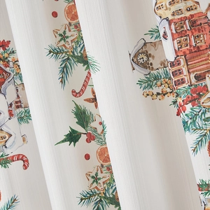 Close-up of Christmas curtains fabric showing holiday patterns and fine striped texture