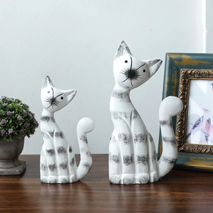 Set of two abstract white and black striped cat figurines for modern home decor
