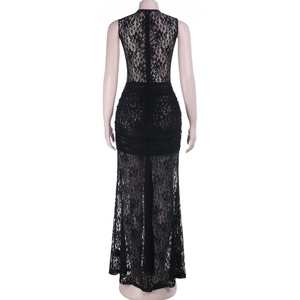 Detail view of sheer black lace back with elegant ruched texture on a slim maxi dress