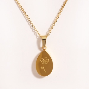 Collier minimaliste en acier inoxydable doré avec pendentif goutte gravé de fleurs