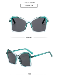 Detail view of butterfly oversized frames in translucent green to black gradient