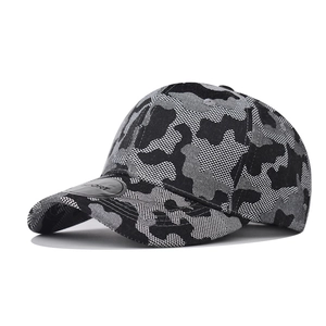 Macro detail of camouflage baseball cap with breathable eyelets and SPORT sticker