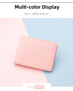 Close-up of pink ultra-thin card holder featuring premium lychee texture and fine stitching