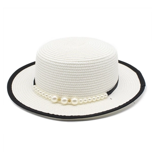 French style white straw flat top hat with black trim and pearl chain decoration
