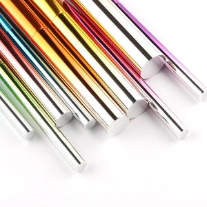 9-piece makeup brush set featuring colorful gradient metal handles on a white background