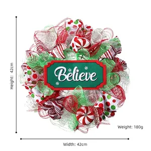 Red and green Christmas wreath with Believe sign and peppermint ornaments, 42x42cm size