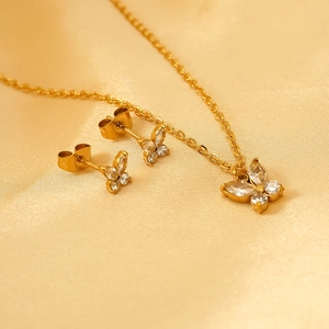 Detailliertes goldenes Schmetterling Halsketten und Ohrring Set mit klaren Zirkonia