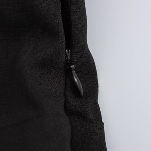 Elegant French black pleated dress featuring puff sleeves and hidden side zipper detail