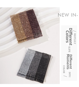 Detail of glitter hair pin sets in gold and silver shades on display cards