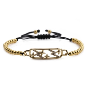 Bracciale di perline dorate con ciondolo a stella e fulmine su cordino nero regolabile