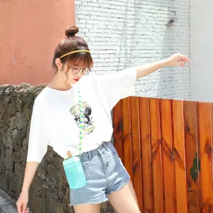Creative mint green popsicle water bottle with adjustable strap shown in outdoor setting