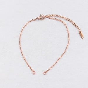 Detail of 2mm rose gold stainless steel bracelet chain with lobster clasp and jump rings