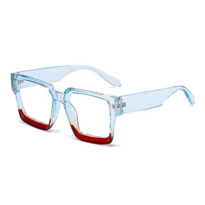 Modern oversized square glasses in transparent blue and reddish-brown gradient frame