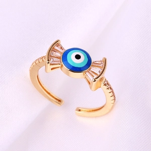 Gold-plated open ring with evil eye motif and clear zircon accents on silk