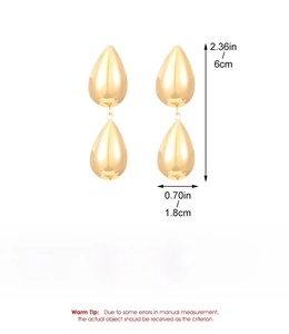 Detail showing dimensions of gold liquid teardrop earrings with precise measurements