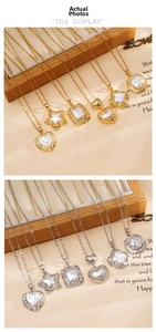Detailed tile display of heart and clover pendants in gold and silver finishes