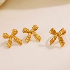 Chic 18K gold plated titanium steel bow earrings set with textured finish for women