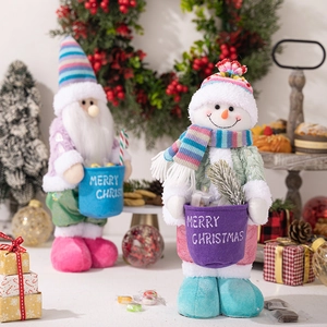 Detailed plush Christmas dolls with striped hats and Merry Christmas buckets