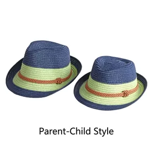 Foldable parent-child straw sun hats in navy and green with elegant woven bands