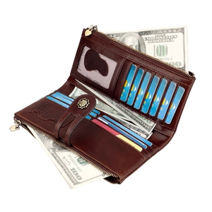 Detail view of open brown leather wallet featuring RFID slots and floral metal clasp