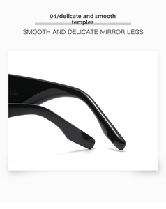 Detail shot of black square sunglasses legs showing smooth finish and 145mm size engraving