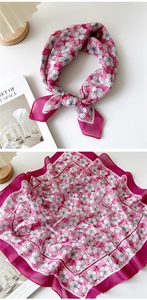 Detailed view of rose pink floral cotton-linen scarf with delicate white flower pattern