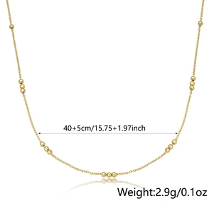Detail view of double-layer gold beaded silver necklace showing 40+5cm length specs