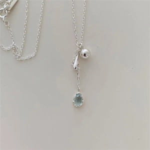 Minimalist 925 sterling silver necklace with faceted light blue teardrop gemstone