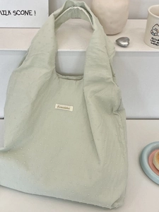 Light green large capacity canvas tote bag with textured Swiss dot fabric for daily use