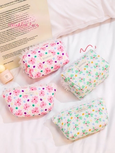 Detailed set of floral lace pouches showing puckered fabric and delicate white lace trim