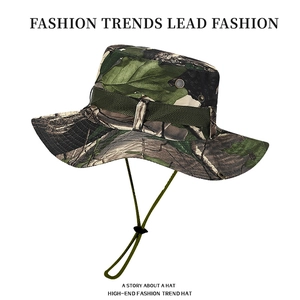 Classic jungle camouflage boonie hat with wide brim, ventilation holes, and windproof strap