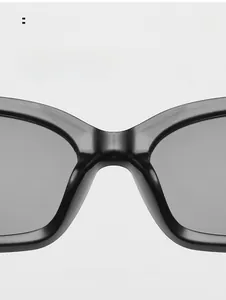 Macro detail of integrated nose pads on black cat-eye sunglasses for comfort