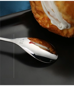Detail of food-grade 304 stainless steel stamp and mirror polished finish on the elk spoon