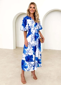 Close-up of the V-neck detail and blue floral print on this puff sleeve A-line maxi dress