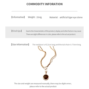 Infographic showing size and 19.4g weight for gold plated tiger eye stone necklace