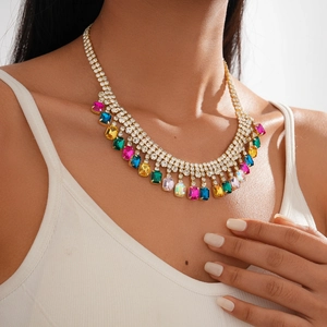 Macro detail of geometric crystal fringe necklace with multi-colored pavé rhinestones
