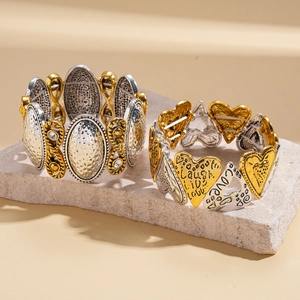 Bracelets élastiques vintage avec disques ovales or et argent, strass et coeurs