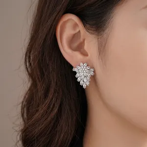 Sparkling marquise-cut crystal flower stud earrings with elegant silver needle setting