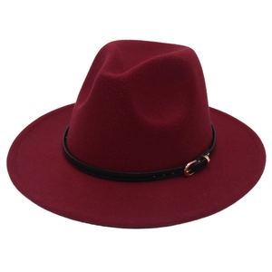 Detail of burgundy wool fedora hat featuring a black leather band and gold buckle