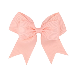 Detail of pink-orange grosgrain ribbon hair bow with neat fishtail cut and ribbed texture