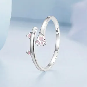 S925 sterling silver cat ring with pink enamel paw and ears in an open design