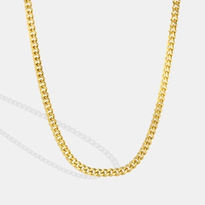 Polished gold curb chain necklace for women featuring a minimalist link design
