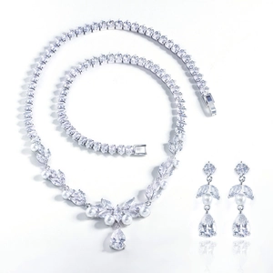 Elegant pearl and AAA zircon jewelry set featuring a necklace and drop earrings on white