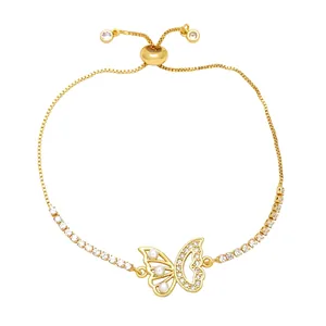 Adjustable gold butterfly bracelet with white pearls and sparkling cubic zirconia stones