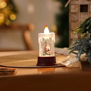 Detail of Santa Claus inside a glowing glitter water lantern with a red embossed base