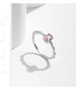 Detailed macro view of S925 sterling silver stamp on pink oval crystal ring band