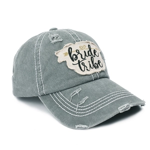 Detailed view of bride tribe embroidery and distressed texture on charcoal baseball cap