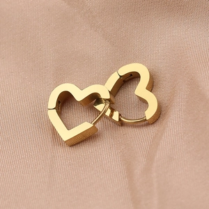 Polished gold heart-shaped hoop earrings in hollow minimalist stainless steel design