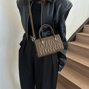 Brown quilted PU leather handbag with adjustable crossbody strap for women stylish commute
